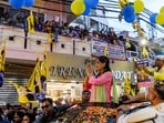 Sunita Kejriwal, wife of Delhi Chief Minister Arvind Kejriwal, during a roadshow in support of the party candidate Mahabal Mishra from West Delhi constituency, in New Delhi.