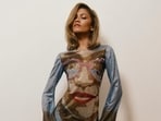 Zendaya turns the poster of the Challengers movie into a Swarovski-adorned mini dress. Zendaya turns the poster of the Challengers movie into a Swarovski-adorned mini dress.