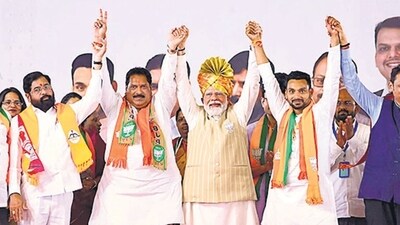 **EDS: IMAGE VIA @Dev_Fadnavis TWEETED ON APRIL 27, 2024** Kolhapur: Prime Minister Narendra Modi with Maharashtra Chief Minister Eknath Shinde, Deputy Chief Minister Devendra Fadnavis and others during an election rally in support of Shiv Sena candidates from Kolhapur and Hatkanangale constituencies Sanjay Mandlik and Dhairyasheel Mane respectively for the Lok Sabha elections, in Kolhapur district. (PTI Photo) (PTI04_27_2024_RPT309A) (PTI) **EDS: IMAGE VIA @Dev_Fadnavis TWEETED ON APRIL 27, 2024** Kolhapur: Prime Minister Narendra Modi with Maharashtra Chief Minister Eknath Shinde, Deputy Chief Minister Devendra Fadnavis and others during an election rally in support of Shiv Sena candidates from Kolhapur and Hatkanangale constituencies Sanjay Mandlik and Dhairyasheel Mane respectively for the Lok Sabha elections, in Kolhapur district. (PTI Photo) (PTI04_27_2024_RPT309A) (PTI)