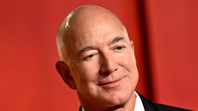 Amazon founder Jeff Bezos likes to scroll on his smartphone, read newspapers and generally let his mind 'wander' in the morning. (AP) Amazon founder Jeff Bezos likes to scroll on his smartphone, read newspapers and generally let his mind 'wander' in the morning. (AP)