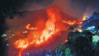 According to an official release, "Chief Minister Dhami reviewed the efforts to prevent forest fire with the officials of Kumaon Division at the Forest Training Academy Haldwani and gave strict instructions to the officers to prevent the forest fires." (PTI) According to an official release, "Chief Minister Dhami reviewed the efforts to prevent forest fire with the officials of Kumaon Division at the Forest Training Academy Haldwani and gave strict instructions to the officers to prevent the forest fires." (PTI)