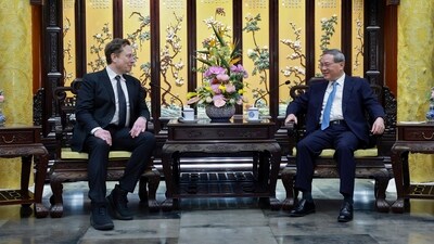 Elon Musk in China: Tesla founder and CEO Elon Musk, left, meets with Chinese Premier Li Qiang in Beijing. (AP) Elon Musk in China: Tesla founder and CEO Elon Musk, left, meets with Chinese Premier Li Qiang in Beijing. (AP)