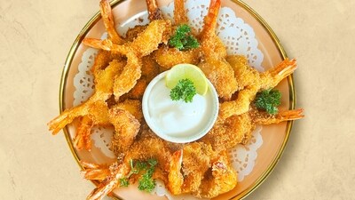 Gourmet delight: Butterfly Prawns with Toum Sauce recipe for culinary enthusiasts (Photo by FreshToHome) Gourmet delight: Butterfly Prawns with Toum Sauce recipe for culinary enthusiasts (Photo by FreshToHome)