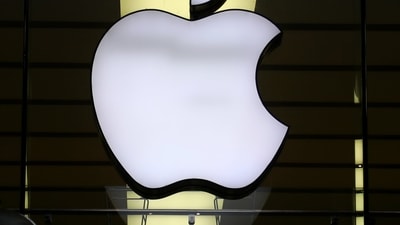 The Apple logo is illuminated at a store in the city center in Munich, Germany. (AP) The Apple logo is illuminated at a store in the city center in Munich, Germany. (AP)