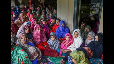 Despite heavy rains, hundreds of locals from the village and surrounding areas, including VDG members, attended Sharief’s burial at his ancestral graveyard. (PTI) Despite heavy rains, hundreds of locals from the village and surrounding areas, including VDG members, attended Sharief’s burial at his ancestral graveyard. (PTI)