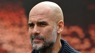 The only thing standing between Manchester City and the EPL title are Arsenal and Pep Guardiola is extremely cautious about his predictions. (AFP)