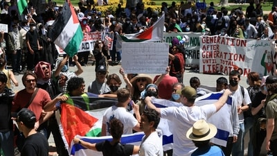 Pro-Israel counter-protesters display Israeli flags near protesters attending a demonstration in support of Palestinians in Gaza, amid the ongoing conflict between Israel and the Palestinian Islamist group Hamas, at the University of California Los Angeles (UCLA) in Los Angeles, California, U.S. April 28, 2024. REUTERS/David Swanson (REUTERS)