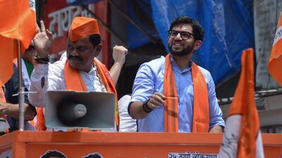 In Thane, 62-year-old Ranjan Vichare was accompanied by fellow MVA leaders Aaditya Thackeray and Jitendra Awhad. In a massive show of strength, the MVA alliance also held a roadshow with thousands of supporters in Thane, which is Shinde’s home turf. Addressing the crowd, Aaditya took a dig at Shinde and the ruling Mahayuti alliance for still not declaring its candidate for the constituency. (Praful Gangurde / HT Photo) In Thane, 62-year-old Ranjan Vichare was accompanied by fellow MVA leaders Aaditya Thackeray and Jitendra Awhad. In a massive show of strength, the MVA alliance also held a roadshow with thousands of supporters in Thane, which is Shinde’s home turf. Addressing the crowd, Aaditya took a dig at Shinde and the ruling Mahayuti alliance for still not declaring its candidate for the constituency. (Praful Gangurde / HT Photo)