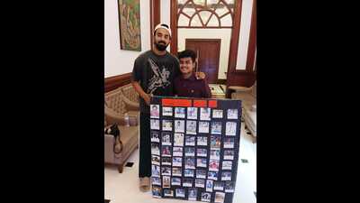 Jayesh Batham (right) poses with KL Rahul after presenting him a collage in Lucknow on Monday (Courtesy LSG)