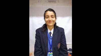 Kamakshi Sharma of Bharti Vidyapeeth Public Senior Secondary School, Baijnath, has shared the top position in science stream with Chhaya Chauhan of Snower Valley Public School, Bajaura. (HT Photo) Kamakshi Sharma of Bharti Vidyapeeth Public Senior Secondary School, Baijnath, has shared the top position in science stream with Chhaya Chauhan of Snower Valley Public School, Bajaura. (HT Photo)
