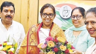 Mumbai, India – April 26, 2024: Congress party supporters greet Congress Leader Varsha Gaikwad after declaring the Mumbai North Central constituency Lok Sabha election 2024 candidate, at the Mumbai Regional Congress Committee office, in Mumbai, India, on Friday, April 26, 2024. (Photo by Bhushan Koyande/HT Photo) Mumbai, India – April 26, 2024: Congress party supporters greet Congress Leader Varsha Gaikwad after declaring the Mumbai North Central constituency Lok Sabha election 2024 candidate, at the Mumbai Regional Congress Committee office, in Mumbai, India, on Friday, April 26, 2024. (Photo by Bhushan Koyande/HT Photo)