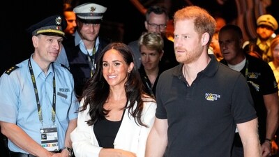 FILE - Britain's Prince Harry, right, and Meghan, Duchess of Sussex, arrive to a wheelchair basketball match at the Invictus Games in Duesseldorf, Germany, Sept. 13, 2023. Prince Harry and his wife, Meghan, will visit Nigeria in May 2024 for talks on the Invictus Games, which he founded to aid the rehabilitation of wounded and sick servicemembers and veterans, a Nigerian official said Sunday, April 28, 2024. (AP Photo/Martin Meissner, File) (AP) FILE - Britain's Prince Harry, right, and Meghan, Duchess of Sussex, arrive to a wheelchair basketball match at the Invictus Games in Duesseldorf, Germany, Sept. 13, 2023. Prince Harry and his wife, Meghan, will visit Nigeria in May 2024 for talks on the Invictus Games, which he founded to aid the rehabilitation of wounded and sick servicemembers and veterans, a Nigerian official said Sunday, April 28, 2024. (AP Photo/Martin Meissner, File) (AP)