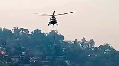 Rahul Anand, Executive Officer of the Nainital Municipal Corporation, explained that safety precautions were taken to allow the IAF helicopters to collect water from Nainital Lake. (PTI) Rahul Anand, Executive Officer of the Nainital Municipal Corporation, explained that safety precautions were taken to allow the IAF helicopters to collect water from Nainital Lake. (PTI)