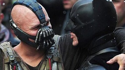Tom Hardy and Christian Bale hug it out on the sets of Christopher Nolan's The Dark Knight Rises. Tom Hardy and Christian Bale hug it out on the sets of Christopher Nolan's The Dark Knight Rises.