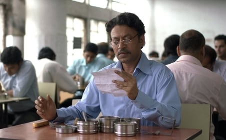 Irrfan aka Saajan reads a note from Ila in a still from The Lunchbox Irrfan aka Saajan reads a note from Ila in a still from The Lunchbox