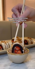 Dip the crepe sushi into a little pot of melted chocolate (Instagram) Dip the crepe sushi into a little pot of melted chocolate (Instagram)