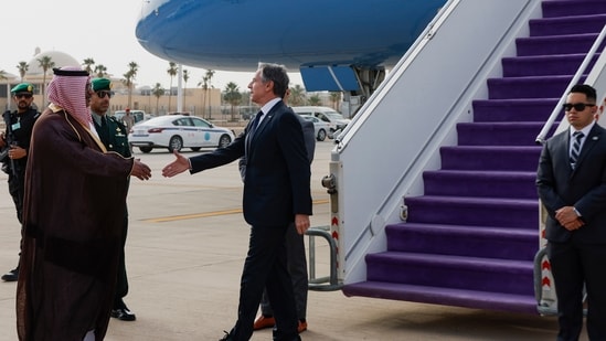 U.S. Secretary of State Antony Blinken is welcomed by Saudi Foreign Ministry Director of Protocol Affairs Mohammed Al-Ghamdi as he arrives in Riyadh, Saudi Arabia (AP)