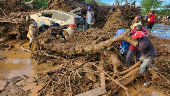 People try to clear the area after a dam burst, in Kamuchiri Village Mai Mahiu, Nakuru County, Kenya on Monday.(AP)