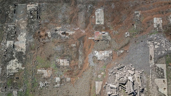 This aerial photo shows the old sunken town of Pantabangan in Nueva Ecija province on April 26, 2024. Remnants of the centuries-old town of Pantabangan reemerged in the northern Philippines after a dam's water level dropped amid a drought that plagues many parts of the country. ((Photo by JAM STA ROSA / AFP))