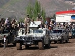 Taliban security personnel stand guard atop a Humevee vehicle in Fayzabad, Badakhshan province. (AFP) Taliban security personnel stand guard atop a Humevee vehicle in Fayzabad, Badakhshan province. (AFP)