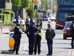 At least five people, including two police officers, were stabbed by a 36-year-old sword-wielding man on Tuesday in a "serious incident" near an east London Tube station, the Metropolitan Police said.