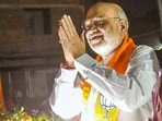 Union home minister Amit Shah during a roadshow for Lok Sabha elections in Guwahati on April 29. 