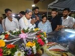 Karnataka Chief Minister Siddaramaiah and Dy CM DK Shivakumar pay last respects to Chamarajanagar MP V Srinivas Prasad who passed away, in Mysuru on Monday. Karnataka Chief Minister Siddaramaiah and Dy CM DK Shivakumar pay last respects to Chamarajanagar MP V Srinivas Prasad who passed away, in Mysuru on Monday.