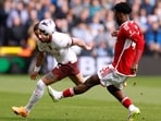 Manchester City's Kyle Walker in action against Nottingham Forest's Ola Aina.