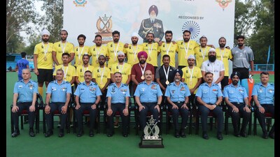 Air Chief Marshal Vivek R Chaudhari with Punjab and Sind Bank team that won the 5th edition of Marshal of the Air Force Arjan Singh Memorial Hockey tournament played at 3BRD, Air Force Station, in Chandigarh. (Keshav Singh/HT) Air Chief Marshal Vivek R Chaudhari with Punjab and Sind Bank team that won the 5th edition of Marshal of the Air Force Arjan Singh Memorial Hockey tournament played at 3BRD, Air Force Station, in Chandigarh. (Keshav Singh/HT)