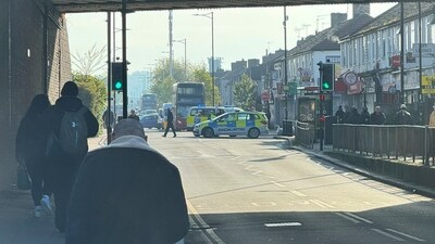 Police say a man wielding a sword attacked members of the public and two police officers on Tuesday in the east London community of Hainault before being arrested. The incident is not being treated as terror-related. (AP) Police say a man wielding a sword attacked members of the public and two police officers on Tuesday in the east London community of Hainault before being arrested. The incident is not being treated as terror-related. (AP)