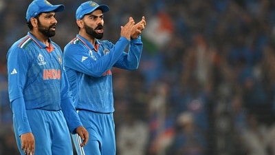 India's captain Rohit Sharma (L) and teammate Virat Kohli (AFP) India's captain Rohit Sharma (L) and teammate Virat Kohli (AFP)