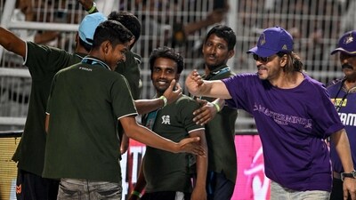 Shah Rukh was in a fun mode with the groundsmen, and was seen greeting them after the match. KKR spinner Varun Chakravarthy revealed how Shah Rukh's words of motivation shaped his performance in the match against DC. (AFP) Shah Rukh was in a fun mode with the groundsmen, and was seen greeting them after the match. KKR spinner Varun Chakravarthy revealed how Shah Rukh's words of motivation shaped his performance in the match against DC. (AFP)