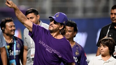 Shah Rukh Khan was seen with son AbRam Khan as they greeted fans after their win at the match. AbRam has been attending many matches with Shah Rukh this season. (AFP) Shah Rukh Khan was seen with son AbRam Khan as they greeted fans after their win at the match. AbRam has been attending many matches with Shah Rukh this season. (AFP)