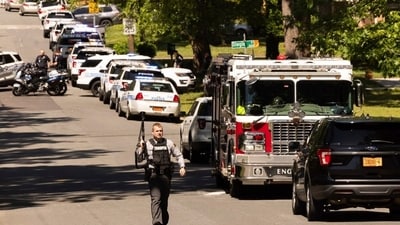 Multiple law enforcement vehicles respond in the neighborhood where several officers on a task force trying to serve a warrant were shot in Charlotte, N.C., Monday, April 29, 2024. (Melissa Melvin-Rodriguez/The Charlotte Observer via AP) (AP) Multiple law enforcement vehicles respond in the neighborhood where several officers on a task force trying to serve a warrant were shot in Charlotte, N.C., Monday, April 29, 2024. (Melissa Melvin-Rodriguez/The Charlotte Observer via AP) (AP)