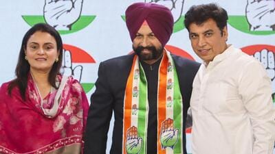 Congress leader Devender Yadav with retired Punjab police ADGP Gurinder Singh Dhillon at AICC office in New Delhi on Tuesday (PTI) Congress leader Devender Yadav with retired Punjab police ADGP Gurinder Singh Dhillon at AICC office in New Delhi on Tuesday (PTI)