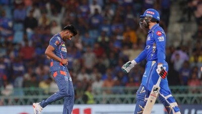 Lucknow Super Giants' Mayank Yadav, left, celebrates the dismissal of Mumbai Indians' Mohammad Nabi (AP) Lucknow Super Giants' Mayank Yadav, left, celebrates the dismissal of Mumbai Indians' Mohammad Nabi (AP)