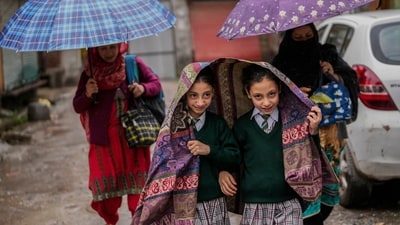 Authorities in Kashmir announced the closure of all schools in the valley on Tuesday as a precautionary measure in view of the rising water level in rivers and streams due to incessant rainfall over the past three days. (AP) Authorities in Kashmir announced the closure of all schools in the valley on Tuesday as a precautionary measure in view of the rising water level in rivers and streams due to incessant rainfall over the past three days. (AP)