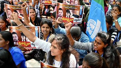 National Students' Union of India (NSUI) supporters along with the students of the Maharani College stage a protest against Janata Dal (Secular) MP Prajwal Revanna, in Bengaluru on Tuesday. (ANI) National Students' Union of India (NSUI) supporters along with the students of the Maharani College stage a protest against Janata Dal (Secular) MP Prajwal Revanna, in Bengaluru on Tuesday. (ANI)