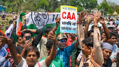 Nadia: People of Matua community demand cancellation of CAA and unconditional citizenship during Chief Minister Mamata Banerjee's election campaign rally ahead of Lok Sabha polls, at Dhubuliya, in Nadia, Sunday, March 31, 2024. (PTI Photo) (PTI03_31_2024_000119B) (PTI) Nadia: People of Matua community demand cancellation of CAA and unconditional citizenship during Chief Minister Mamata Banerjee's election campaign rally ahead of Lok Sabha polls, at Dhubuliya, in Nadia, Sunday, March 31, 2024. (PTI Photo) (PTI03_31_2024_000119B) (PTI)