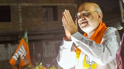 Union home minister Amit Shah during a roadshow for Lok Sabha elections in Guwahati on April 29. (PTI)