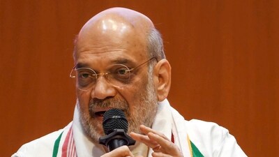 Amit Shah addresses a press conference at the Vajpayee Bhawan, in Guwahati. (PTI) Amit Shah addresses a press conference at the Vajpayee Bhawan, in Guwahati. (PTI)