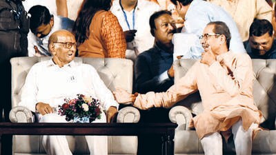 Sharad Pawar (left) and Uddhav Thackeray during a public rally at Warje for Baramati Lok Sabha constituency candidate Supriya Sule. Pawar said his soul is “asvastha” (restless) for the cause of farmers and the common man, and ready to be restless “100 times” to highlight their plight. (MAHENDRA KOLHE/HT)