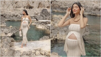 Alanna posted pictures from her vacation in Capri with the caption, "Missing the Capri sun." The photos show her posing barefoot in a gorgeous location, dressed in a beige-coloured crochet blouse and skirt set. She flaunted her growing baby bump in the images. The stylish look should be on your radar if you are a new mom-to-be. Don't forget to add it to your next beach vacation mood board. (Instagram) Alanna posted pictures from her vacation in Capri with the caption, "Missing the Capri sun." The photos show her posing barefoot in a gorgeous location, dressed in a beige-coloured crochet blouse and skirt set. She flaunted her growing baby bump in the images. The stylish look should be on your radar if you are a new mom-to-be. Don't forget to add it to your next beach vacation mood board. (Instagram)