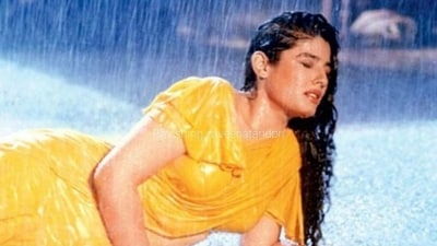 Raveena Tandon redefined sensuality with this yellow saree in Mohraa. Years later, even Katrina Kaif tried to recreate this look with Sooryavanshi's Tip Tip Barsa Pani but wasn't as successful. 