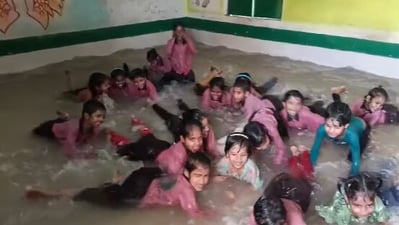 Students are seen swimming in an artificial pool. Students are seen swimming in an artificial pool.