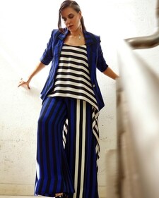 Neha Dhupia in a striped co-ord set (Photo: Instagram) Neha Dhupia in a striped co-ord set (Photo: Instagram)