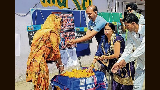 City residents pay tributes to the victims on Tuesday. (HT Photo)