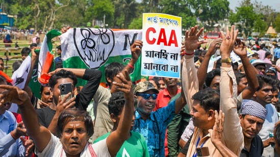 Nadia: People of Matua community demand cancellation of CAA and unconditional citizenship during Chief Minister Mamata Banerjee's election campaign rally ahead of Lok Sabha polls, at Dhubuliya, in Nadia, Sunday, March 31, 2024. (PTI Photo) (PTI03_31_2024_000119B) (PTI)