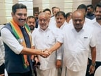 Karnataka Bharatiya Janata Party (BJP) president Vijayendra Yediyurappa (left) greets former state CM and Janata Dal (Secular) leader HD Kumaraswamy. Karnataka Bharatiya Janata Party (BJP) president Vijayendra Yediyurappa (left) greets former state CM and Janata Dal (Secular) leader HD Kumaraswamy.