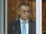 Binance founder and CEO Changpeng Zhao leaves federal court in Seattle.
